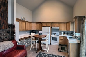 The kitchen has a full size dishwasher, stove and refrigerator set up for your comfort and it also comes equipped with all of the basic needs for meal preparations .  