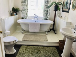 Palm House Bathroom with views over the walled garden