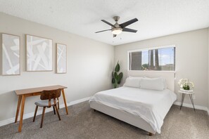 Bedroom with queen bed, office space & walk in closet