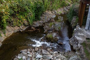 Upper Covered Deck View Of The Mighty Roaring Fork Stream That Flows Right Out Of The Great Smoky Mountains National Park!