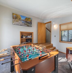 Fooseball and Other Games in the Game Room which Doubles as a 4th Sleeping Area with a Queen Sleeper Sofa