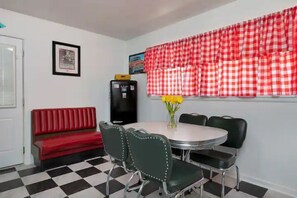 Classic vintage look refrigerator and extra diner booth seating