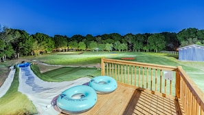 The top of our 170' slip-and-slide, overlooking our disc golf course, mini top golf course, and softball field