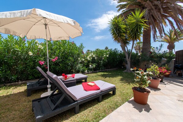 Sun loungers on terrace