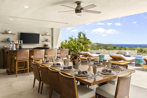 Outdoor dining area with bar area