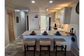 fully stocked kitchen  ! quartz counter tops !