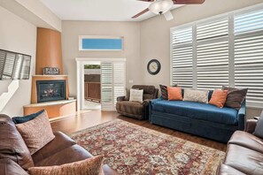 Upstairs living room with plenty of seating to gather with family and friends. The blue daybed with trundle is very comfy and can be used for extra sleeping arrangements.