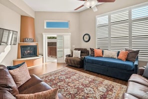 Upstairs living room with plenty of seating to gather with family and friends. The blue daybed with trundle is very comfy and can be used for extra sleeping arrangements.
