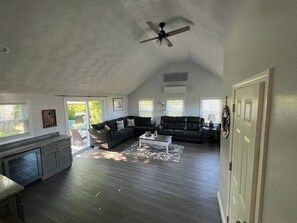 Great room with wet bar and half bath