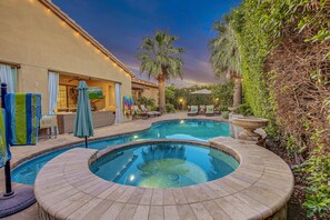 This rare oasis is surrounded by 15-foot lushes hedges making it private and exclusive.
