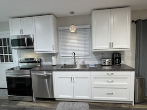 Beautiful new kitchen, all stainless steel appliances.  Full stocked.  