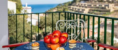 Table, Food, Plant, Furniture, Property, Sky, Tableware, Chair, Azure, Outdoor Table