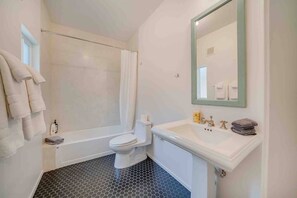 Clean modern bathroom with luxurious Brooklinen towels