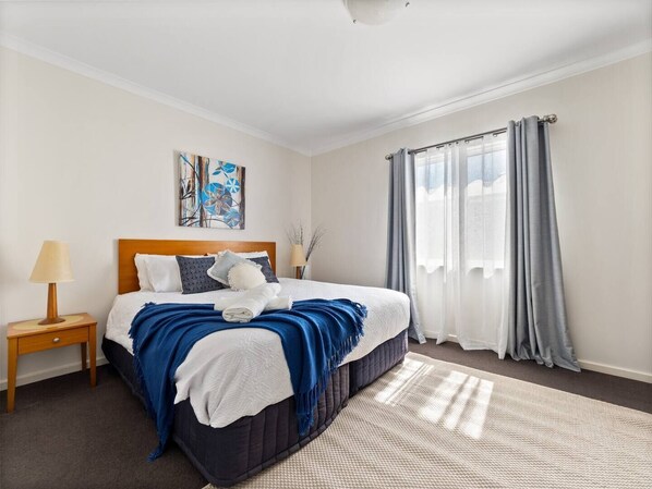Sleep in this cozy queen size bed 