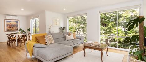 Light and bright living space with treed outlook