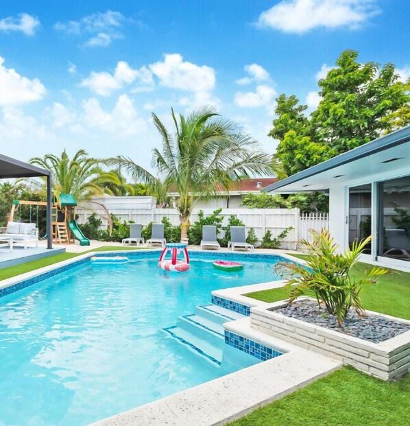 Relax, play, and unwind in our backyard oasis!