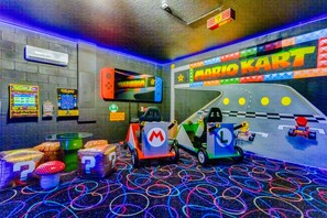 Play Mario Kart while sitting in Mario Karts!