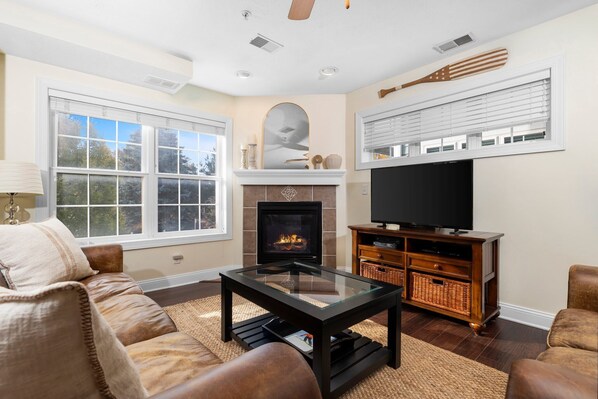 Bright living room with gas fireplace!