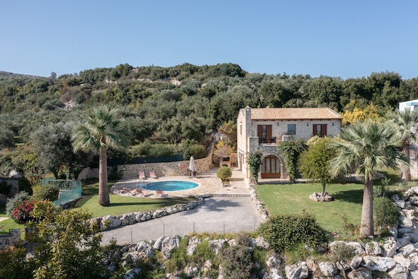 Hilltop villa exterior view, swimming pool