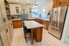 Kitchen fully stocked with all the essentials for prepping and cooking