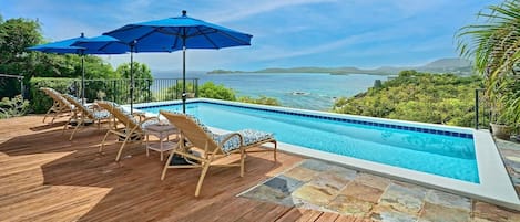 Large pool deck overlooking the gorgeous Caribbean water