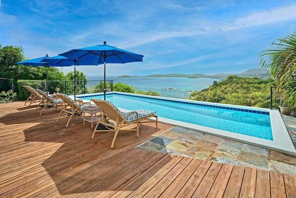 Large pool deck overlooking the gorgeous Caribbean water