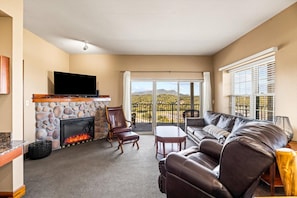 Spacious living room includes a queen size sofa sleeper. Gorgeous Views!! Smart TV with cable and streaming capabilities.