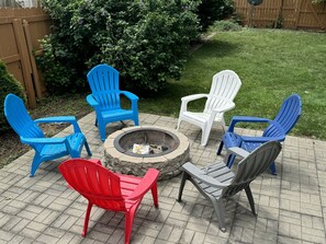 We've got a fire pit for roasting marshmallows, Welcome to your backyard paradise! Enough Adirondack Chairs for bigger group |