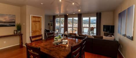 Relax in our open-concept living area, with stunning views of the harbor and the Chilkat Mountain Range.