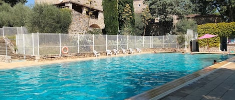 Take a dip in the lovely outdoor pool!