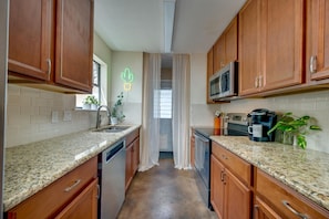 Kitchen with access to back yard