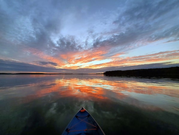 Sunset on fishing kayak