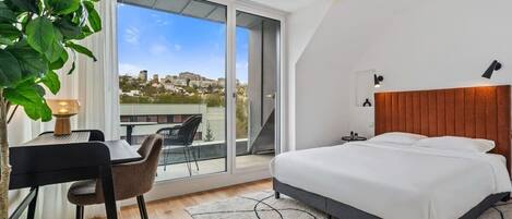 Wake up to stunning city views in this bright, modern bedroom. Direct bookings: www.arcaproperties.lu
