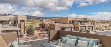 Upstairs Patio East View - Stay warm next to the fire-pit and relax while watching the sunset over the mountains.