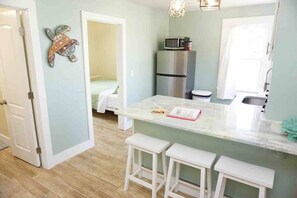 Eat in kitchen with seating for 3, plus the portable dining table with seating for 2!