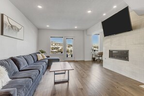 Natural Light abounds in the wide open concept living area. 