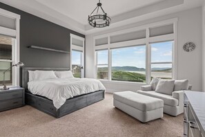 Deer Springs 12797 Summer: Cozy Bedroom: "Sunlight streams in, casting a warm glow on the inviting space."