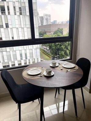 Dining and work taNext to the window, a small table beckons for work or a peaceful cup of coffee. Bask in the tranquil atmosphere and admire the picturesque view.ble