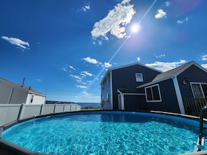 Pool with Waterfront view. Life jackets are available for non swimmers