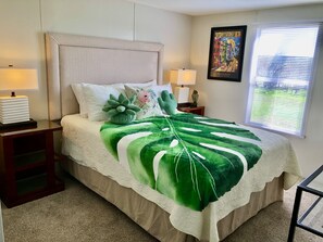 Queen-size bed in bedroom 2