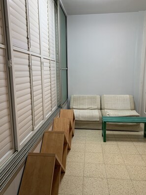 Porch that can be used for additional sleeping with two foutons.