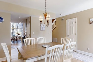 Dining table seats 6 comfortable with additional seating for 4 in the kitchen