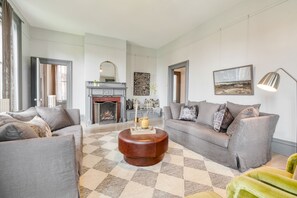 Living room features a fireplace.