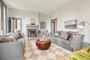 Living room features a fireplace.