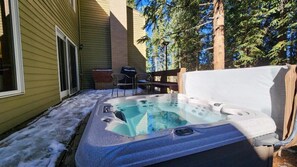 Your group will love soaking in this private 6-person hot tub off the outdoor deck with nothing but nature and tree views surrounding you.