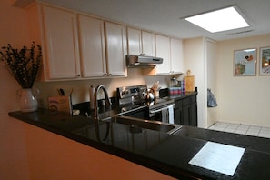 Fully equipped kitchen, with all appliances, cookware and dishware needed. 