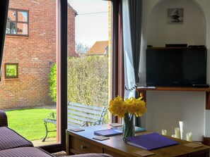 Lounge area with patio doors  | Keel Cottage, Whitby