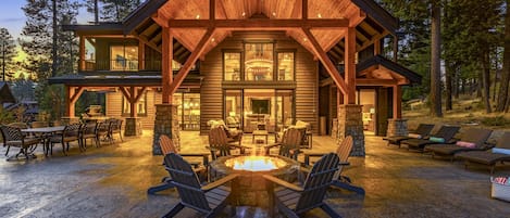 Massive outdoor gas fire pit with 8 Adirondack Chairs