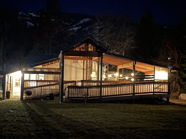 Back deck and entertainment space facing river and mountains.