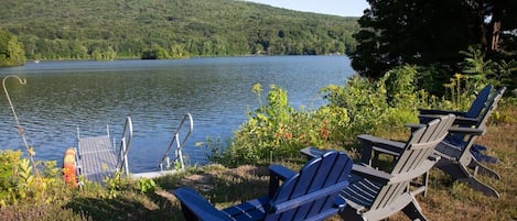 Adirondack chairs by the lake